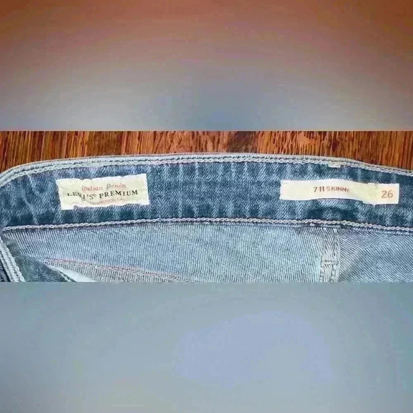 LEVIS Premium 711 Mid Rise Skinny Jean with Raw Hem in Light Wash - Picture 6 of 13